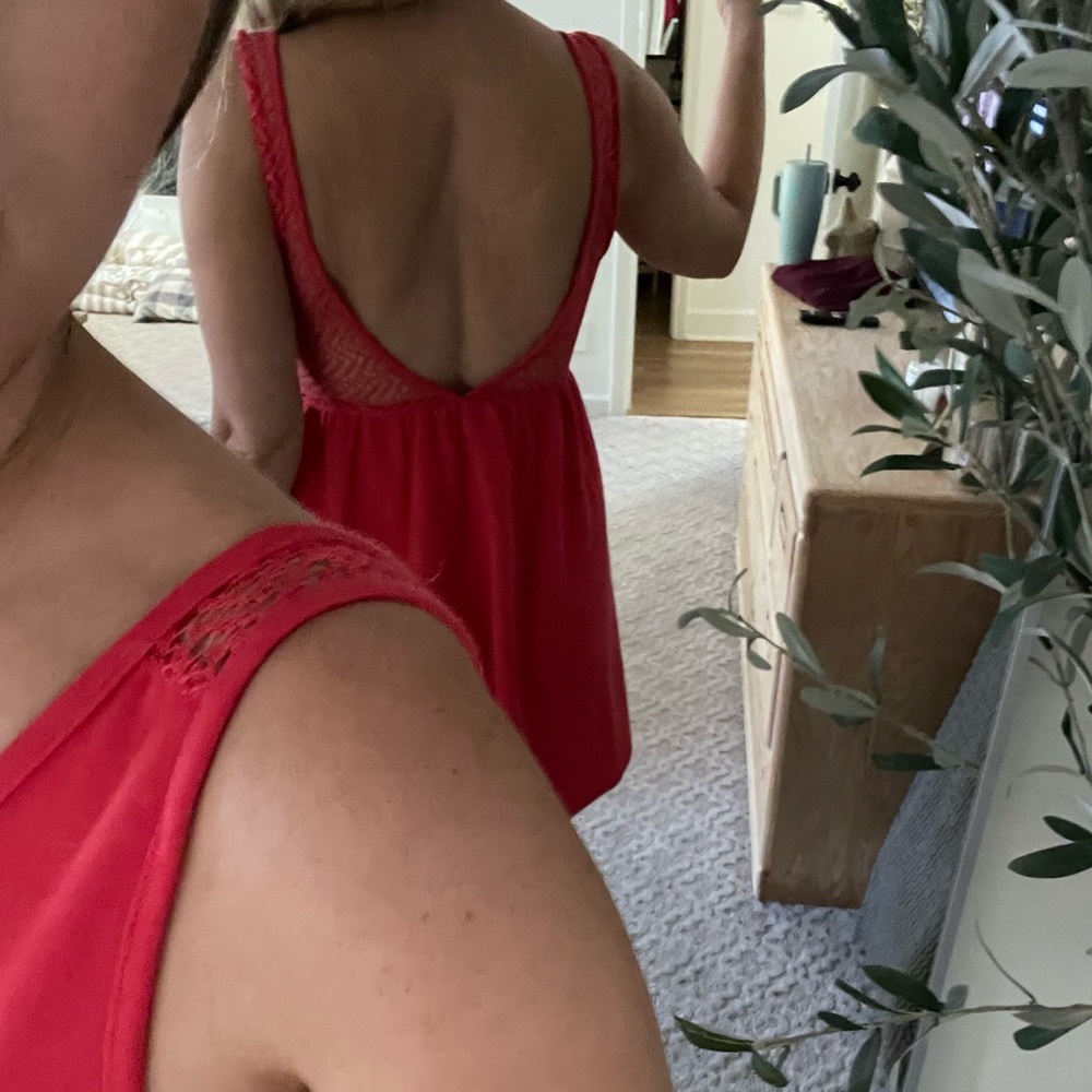 Pink detail open back dress.